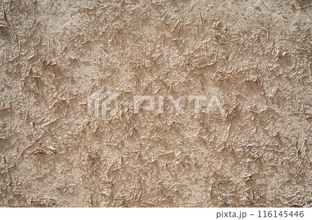 texture of an old ancient Asian clay wall with straw texture of an old ancient Asian clay wall with straw 116145446