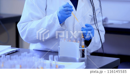 Image of shapes over african american female scientist in lab 116145585