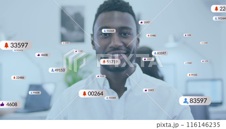 Image of social media icons with numbers over diverse business people Image of social media icons with numbers over diverse business people 116146235