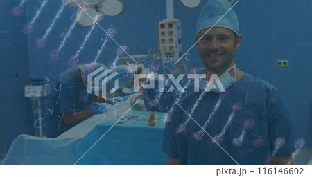 Image of dna rotating over happy caucasian male surgeon 116146602