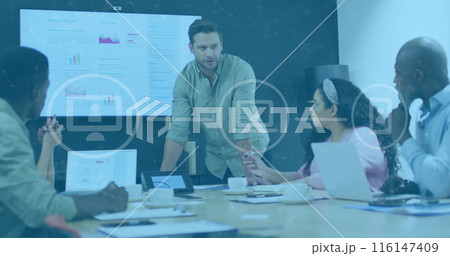 A group of diverse businesspeople discussing work during a meeting at the office the setting appears 116147409