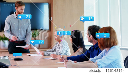 Image of social media data processing over diverse business people in office 116148164