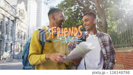 Image of friends text over happy biracial male friends with map 116148798