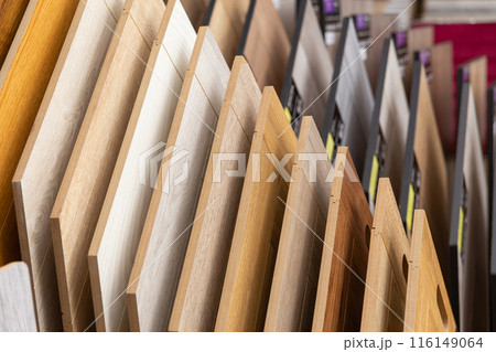 Samples of laminate or parquet with a pattern and wood texture for flooring 116149064