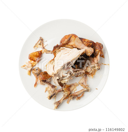 Chicken Leftovers, Unfinished Grilled Chicken on Dirty Plate Isolated, Meat Pieces and Bones 116149802
