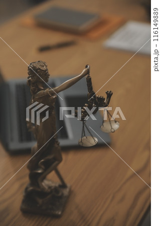 Judge gavel with Justice lawyers having team meeting at law firm background. Concepts of Law and Legal services. 116149889