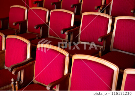 red empty seats for spectators in the theater or cinema close-up 116151230
