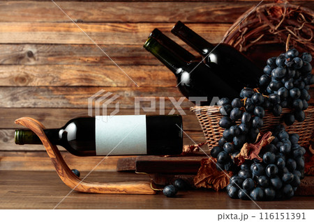Bottle of red wine with empty label. Bottle of red wine with empty label. 116151391