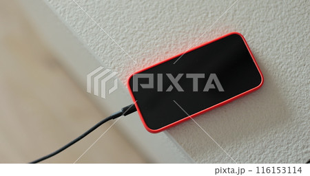 Close-up of the charging connection to smartphone. Phone charging port. Mobile smartphones charging. Close-up of the charging connection to smartphone. Phone charging port. Mobile smartphones charging. 116153114