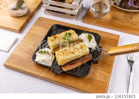 Fried polenta with bacon 116155923