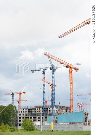 A construction crane on a blue sky background. 116157626