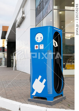 Manual car wash with pressurized water in car wash outside. Summer Car Washing. Cleaning Car Using High Pressure Water. Washing with soap. Close up concept. 116158248
