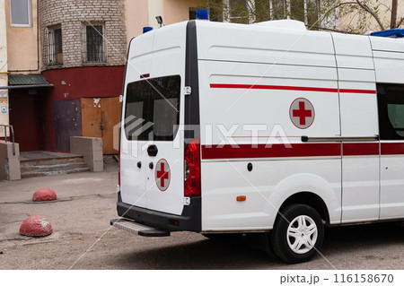 Ambulance at the entrance of the house 116158670