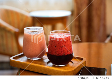 Well being and weight loss concept, berry smoothie.On wooden table with ingredients, from above. 116158735
