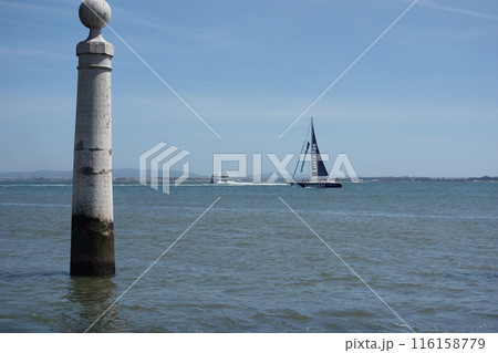 Sightseeing sailing boat carrying passengers along the Tagus river, Lisbon, Portugal 116158779