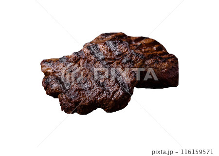 Fresh juicy delicious beef steak on a dark background 116159571