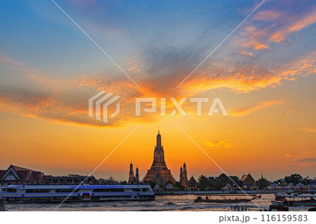Wat Arun Ratchawararam Ratchawaramahawihan at sunset in bangkok Thailand. Landmark of Along the Chao Phraya River Thailand 116159583