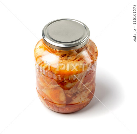Kimchee in a glass jar isolated. Spicy kim chi, hot fermented napa cabbage, jimchi, korean gimchi 116161578