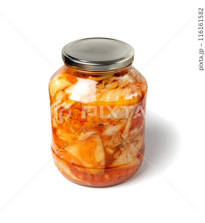 Kimchee in a glass jar isolated. Spicy kim chi, hot fermented napa cabbage, jimchi, korean gimchi 116161582