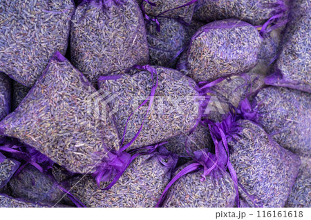 Dry lavender flowers in many bags, lavandula perfume buds, petals, fragrance lilac blossoms Dry lavender flowers in many bags, lavandula perfume buds, petals, fragrance lilac blossoms 116161618