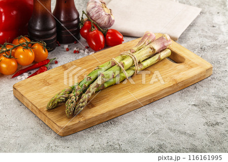 Raw green asparagus stem heap 116161995
