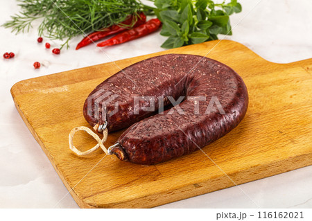 Delicious dry cured beef basturma on table, closeup Delicious dry cured beef basturma on table, closeup 116162021