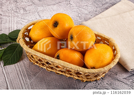 Ripe sweet juicy medlar fruit 116162039