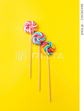 Color lollipop, spiral candy on stick, colorful striped lollypop, round fruit caramel, circle lollipop Color lollipop, spiral candy on stick, colorful striped lollypop, round fruit caramel, circle lollipop 116162498