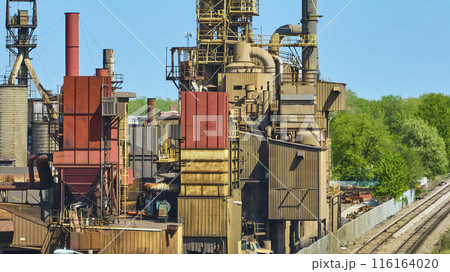 Aerial View of Vibrant Industrial Complex with Storage Tanks and Pipelines Aerial View of Vibrant Industrial Complex with Storage Tanks and Pipelines 116164020