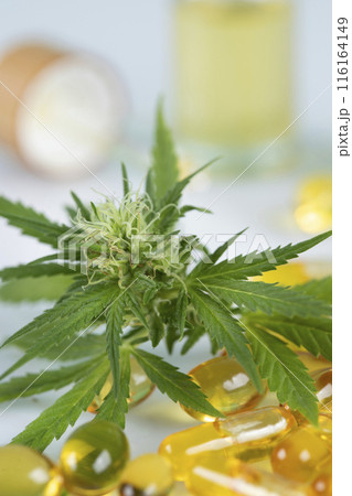 Marijuana oil, leaf and capsules on a white background 116164149