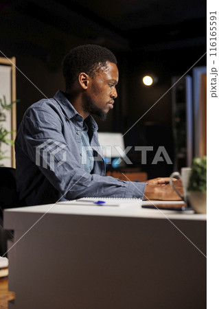 Ambitious pupil acquires knowledge in business administration via web based training program, focusing on webinar with certified mentor. Young man decided to study banking and commerce. Ambitious pupil acquires knowledge in business administration via web based training program, focusing on webinar with certified mentor. Young man decided to study banking and commerce. 116165591