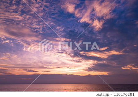 Nature beautiful Light Sunset or sunrise over sea, Colorful dramatic majestic scenery Sky with Amazing clouds and waves in sunset sky Nature beautiful Light Sunset or sunrise over sea, Colorful dramatic majestic scenery Sky with Amazing clouds and waves in sunset sky 116170291