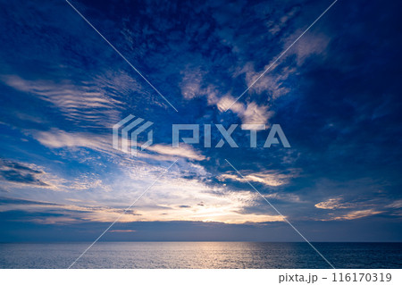 Nature beautiful Light Sunset or sunrise over sea, Colorful dramatic majestic scenery Sky with Amazing clouds and waves in sunset sky 116170319