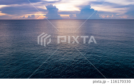 Nature beautiful Light Sunset or sunrise over sea, Colorful dramatic majestic scenery Sky with Amazing clouds and waves in sunset sky 116170330