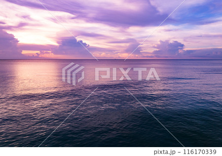 Nature beautiful Light Sunset or sunrise over sea, Colorful dramatic majestic scenery Sky with Amazing clouds and waves in sunset sky Nature beautiful Light Sunset or sunrise over sea, Colorful dramatic majestic scenery Sky with Amazing clouds and waves in sunset sky 116170339