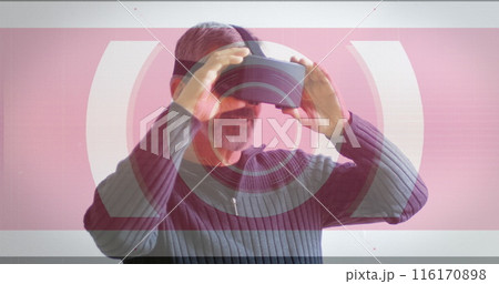 Image of scope scanning and data processing over man wearing vr headset 116170898