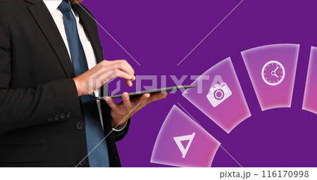Image of multiple icons over midsection of businessman scrolling on digital tablet 116170998