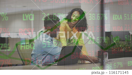 Image of multicolored trading board over diverse coworkers discussing reports on desk in office Image of multicolored trading board over diverse coworkers discussing reports on desk in office 116171145
