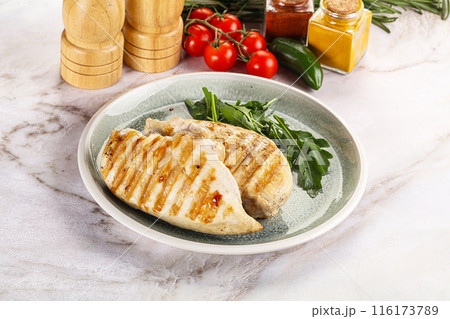 Grilled chicken breast served arugula 116173789