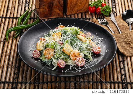 Tasty Caesar salad with prawn 116173835