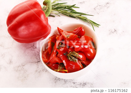 Pickled red bell pepper in the bowl 116175162