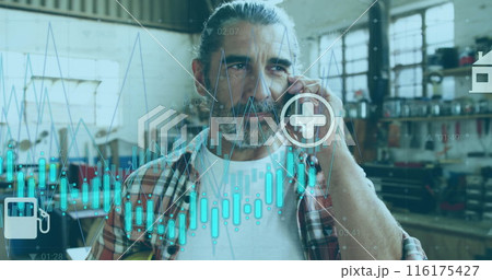 Image of graph with energy and media icons over mature caucasian male carpenter talking on phone 116175427