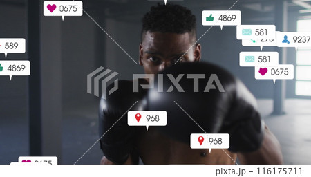 Image of falling notification bars over african american boxer practicing punches Image of falling notification bars over african american boxer practicing punches 116175711