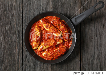 German Currywurst, pork sausages in a curry sauce 116176031