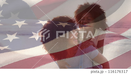 Image of flag of united states of america over happy african american mother with daughter Image of flag of united states of america over happy african american mother with daughter 116176317