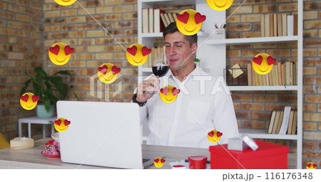 Image of emojis with red hearts flying over caucasian man drinking red wine on laptop image call Image of emojis with red hearts flying over caucasian man drinking red wine on laptop image call 116176348