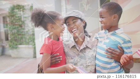 Image of flag of usa over african american female soldier with her children 116176815