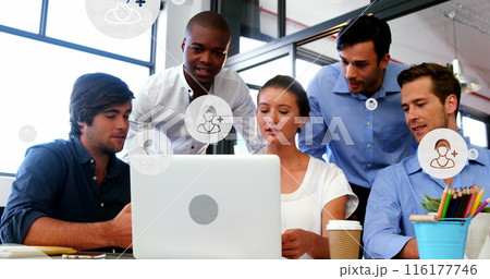 Image of profile icons in circles over diverse coworkers discussing reports on laptop at office Image of profile icons in circles over diverse coworkers discussing reports on laptop at office 116177746