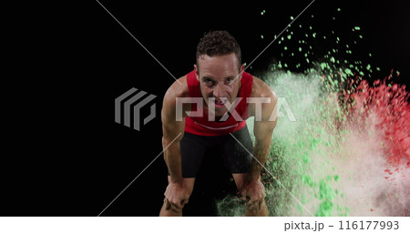 Image of colourful powders over male athlete resting Image of colourful powders over male athlete resting 116177993
