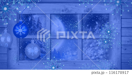 Image of snowflakes over window with night winter landscape and baubles 116178917